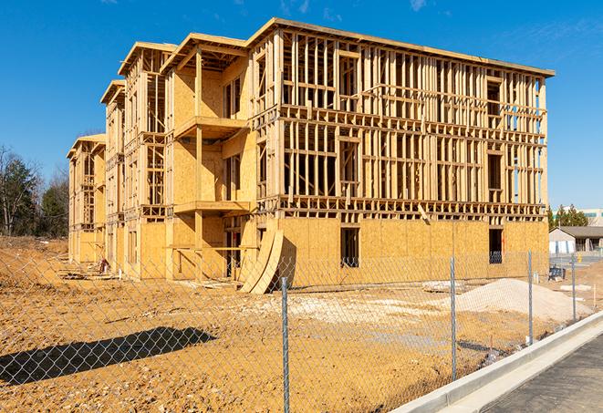 a snapshot of temporary chain link fences protecting a large construction project from unauthorized access in Crockett